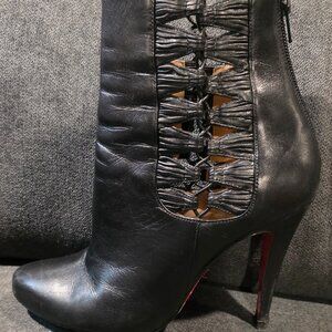 Authentic Christian Louboutin size 7 heeled boots